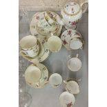 A Royal Doulton foliate-decorated bone china tea part-service, 20 pieces a Crown Staffordshire