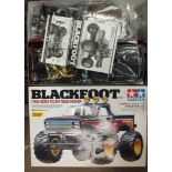 A Tamiya Blackfoot 1/10th scale R/C off-road pick-up, boxed, (unused).