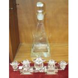 A Swarovski cut-crystal five-light pricket candelabrum, 32cm long, (small chip) and a modern