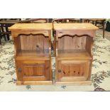 Two similar pine bedside cupboards, 42cm wide, 61cm high.