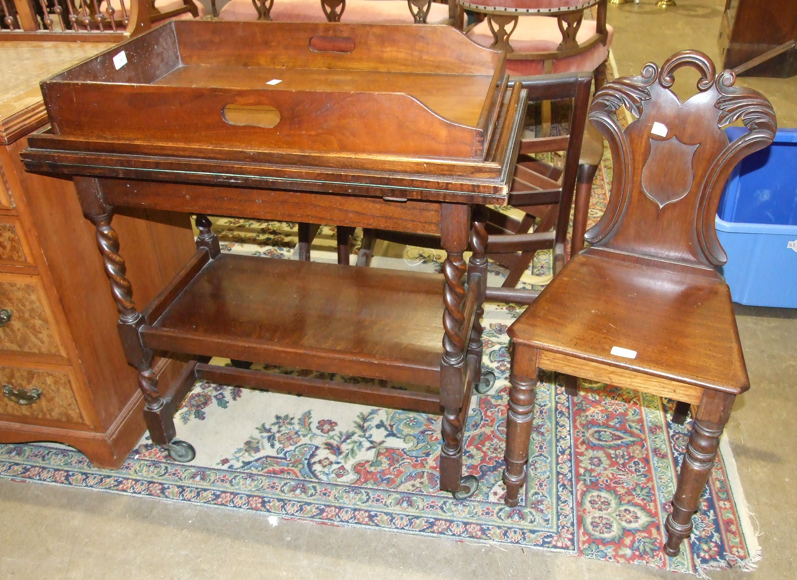 A Victorian mahogany butler's tray, the sides pierced for handles, 70 x 44cm and a Victorian