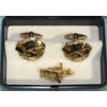 A pair of 9ct gold cufflinks, gross weight 10.8g and a 9ct gold crucifix on chain, 1.1g, (2).