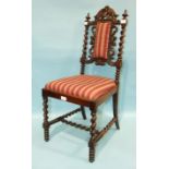 A child's Victorian rosewood chair with carved pierced and spiral back, drop-in seat and turned legs