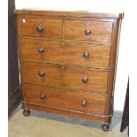 A late-19th century mahogany finish rectangular chest of two short and three long drawers, on turned