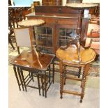 An oak display cabinet, the rectangular top above a pair of leaded-light doors, on turned supports