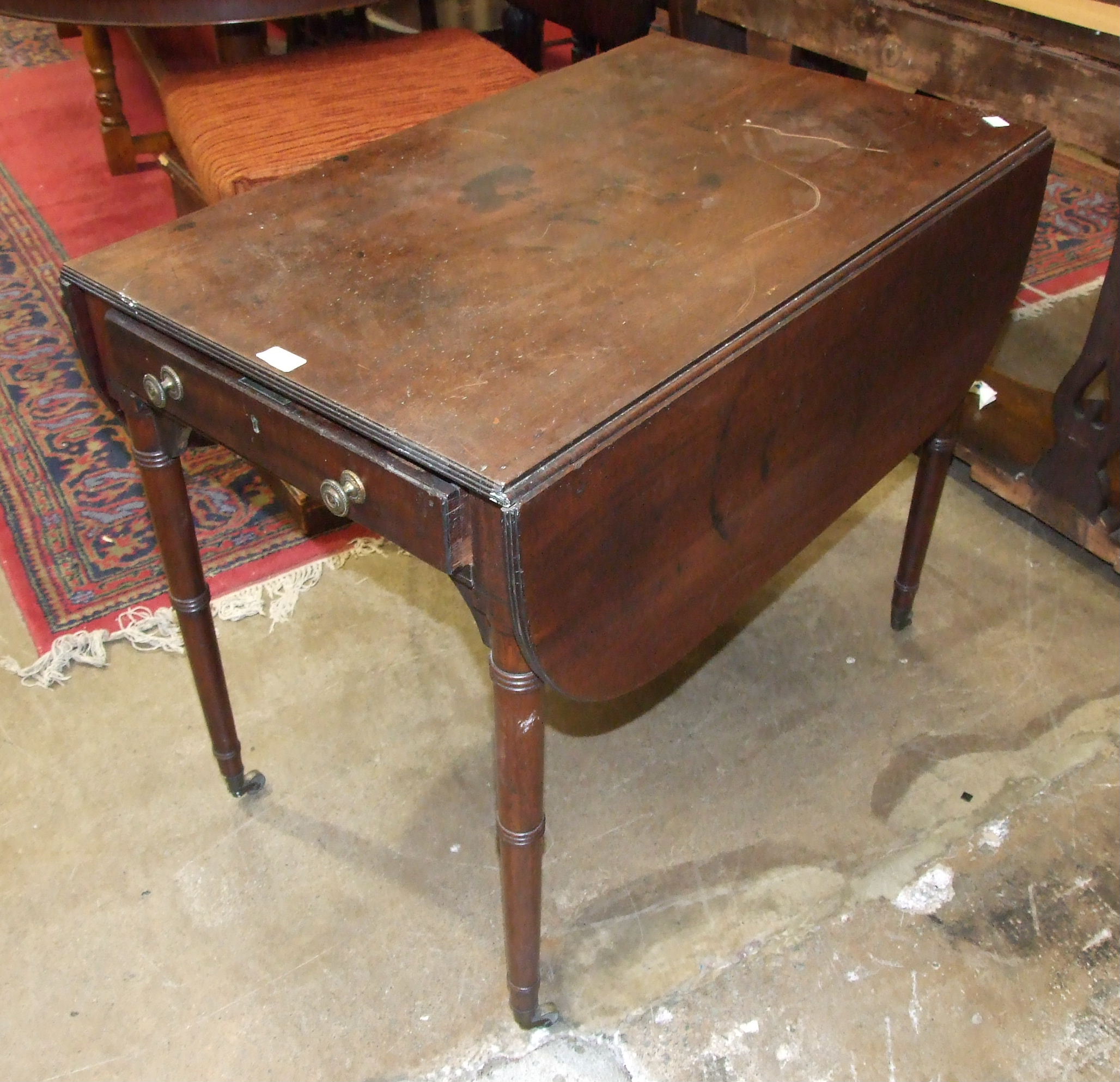 A Victorian drop-leaf breakfast table, the rectangular top above an end drawer, on turned column and - Image 2 of 2