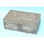 An Indian white metal box embossed with wild animals, (a/f).