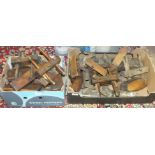 A collection of wooden moulding planes, and others.