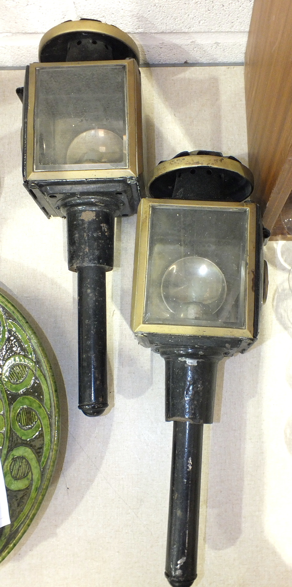A pair of 19th century candle coach lamps stamped 'Raydyot', 46cm high, both with one cracked and