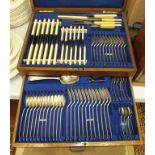 A plated twelve-setting canteen of cutlery by H Williamson, in fitted oak box, with drawer, (two