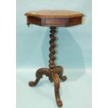 A Victorian rosewood octagonal work table on twist column and tripod support, 44cm wide, 77cm high.