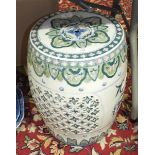 A reproduction Oriental ceramic garden seat of barrel shape, 45cm high.