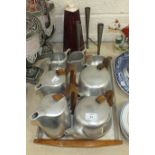 Two four-piece Picquot ware tea services, on tray, The Chiltern Jug by Acme vacuum flask and