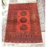 A modern wool rug with red ground, 197 x 145cm and a corridor runner, 290 x 82cm, (2).