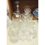 A collection of cut-glass sundae dishes, a cut-glass water jug and other glassware.
