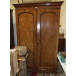 A Victorian mahogany two-door wardrobe on plinth base, 133cm wide, 210cm high.
