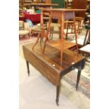 A late-19th century mahogany Pembroke table fitted with an end drawer, on turned legs, a small