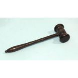 A rosewood gavel with turned handle, 20cm long.