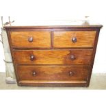 A late-19th century mahogany finish rectangular chest of two short and two long drawers, feet