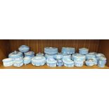 A collection of eighteen Wedgwood blue and white jasperware boxes, three lighters and four other