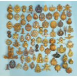 A collection of approximately seventy-five various military badges, (75).