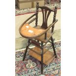 A doll's metamorphic high chair, a turned wood cot with mattress, 62cm long, 64cm high and a child's