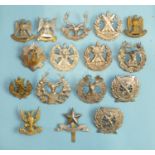 A collection of sixteen Scottish regiments badges, including London Scottish (x2), Liverpool