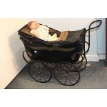 The Cosette Baby Car, Wm Johnson & Sons, Plymouth, a dolls pram with painted wood body, Rexine