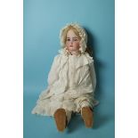 A Kammer & Reinhardt, Simon & Halbig bisque head doll with sleeping blue eyes, blonde replacement