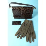 A good-quality vintage crocodile handbag with suede and moiré lining, a similar purse and a pair