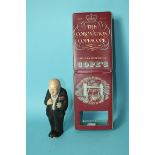 A painted plaster figure of Winston Churchill, (a/f, cigar missing) and a 1953 "Coronation