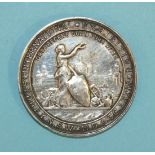An Australian Exhibition Medal, white metal, 5cm wide, Sydney NSW International Exhibition 1879
