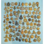 A collection of one hundred various military badges, (100).