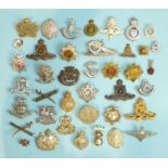 A collection of forty various military badges, (40).