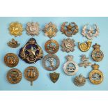 A collection of twenty various military badges, including Royal Lancaster, 10th Battn County of