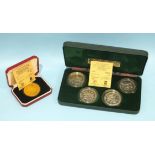 A Pobjoy Mint .925 silver proof set of four crowns commemorating the 1980 Olympics and a similar