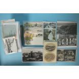 Approximately 250 postcards of Plymouth, including RPs, three Raphael Tuck Heraldic cards, etc.