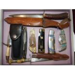 A collection of four Franklin Mint decorative penknives, and others.