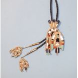 A Henry Cellicion Zuni white metal Rainbow Man bolo, set with mother-of-pearl, turquoise and stones,