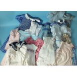 A quantity of children's clothes: an Eltain Wear smocked cotton dress, other smocked dresses, two