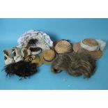 A quantity of doll's straw hats, wigs, a pair of size 3 baby shoes, stands, etc.