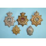 A collection of five various military badges, including The Duke of Cornwall's Lt Inft (a/f), Duke