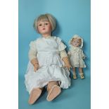 A small all-composition doll with sleeping blue eyes, marked 'Sally/A/Petite/Doll', 32cm and a