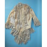 An 18th century ivory silk bodice in very poor condition, with late additions of lace, a 19th