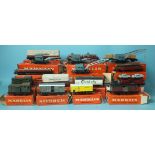 Märklin HO gauge, seven coaches and baggage cars in orange bicycle boxes: 329/1 (3), 329/4 (2),