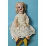 An Armand Marseille bisque head doll with sleeping blue eyes, blonde mohair wig and jointed