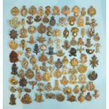 A collection of one hundred various military badges, (100).