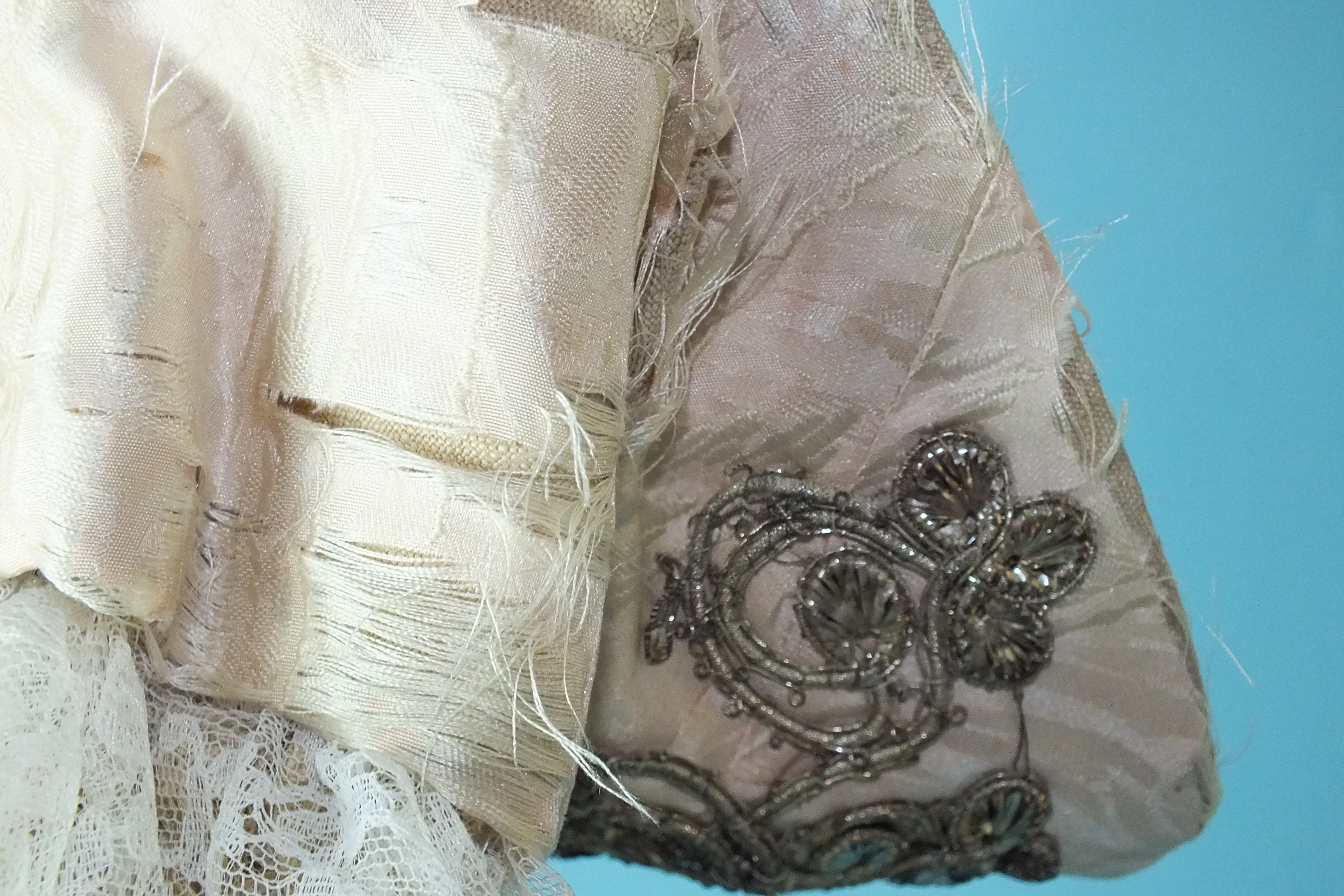 A late-18th century gentleman's very pale pink silk brocade coat, the front and cuffs embellished - Image 4 of 6