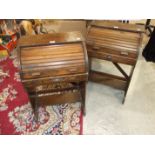 A pair of children's pitch pine roll-top desks, 52cm wide, 77cm high, (2).