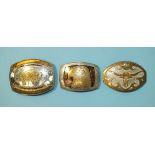 A similar lot with mother-of-pearl and brass decoration, depicting bison and eagle, 10cm (x2) and